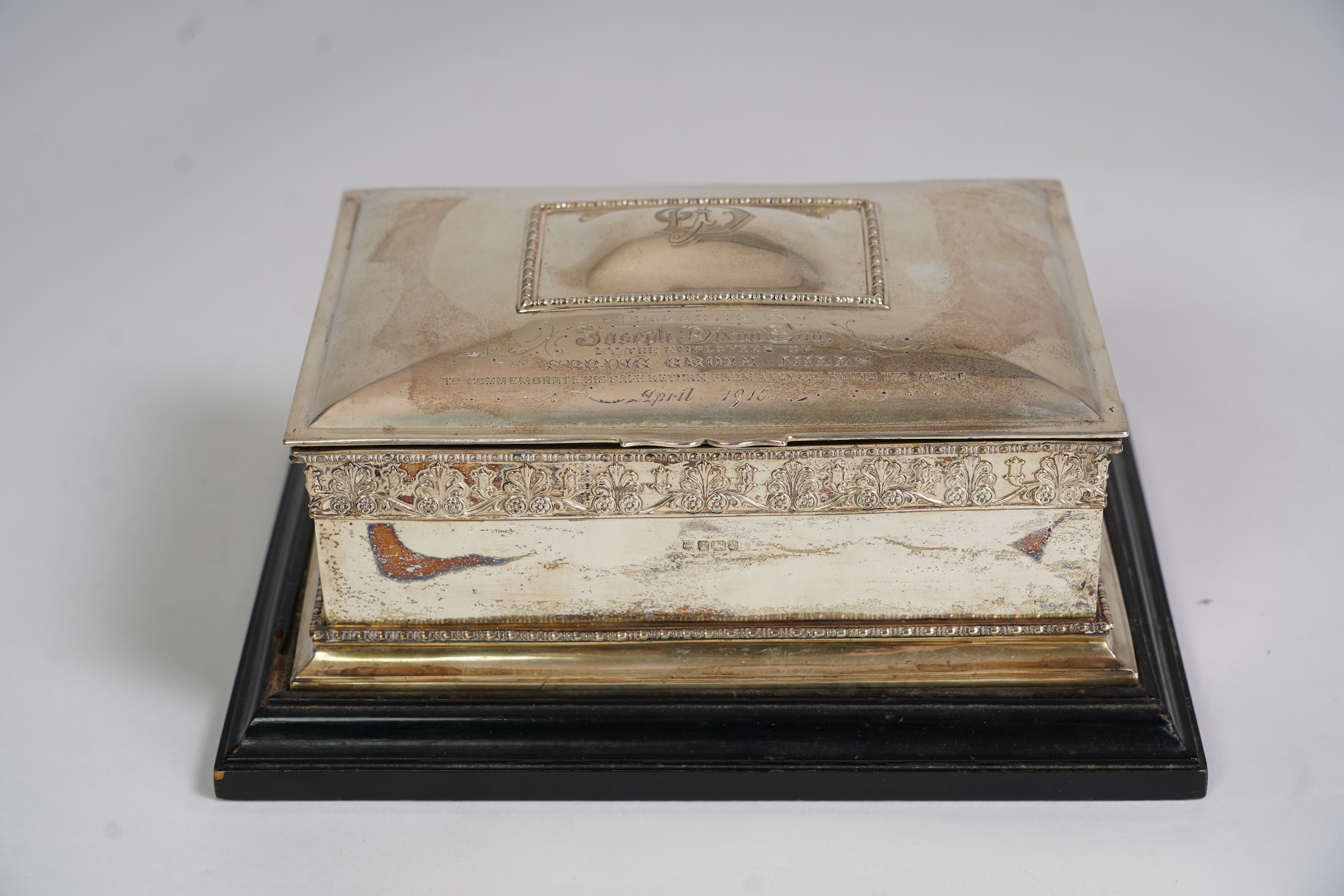 An Edwardian silver presentation cigar box, by Cooper Brothers and Sons